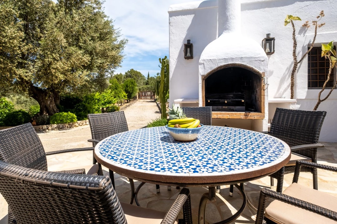 1684146345-Prospectors Luxury real estate Ibiza to rent villa Can Xauret spain property dining sea view outside.webp